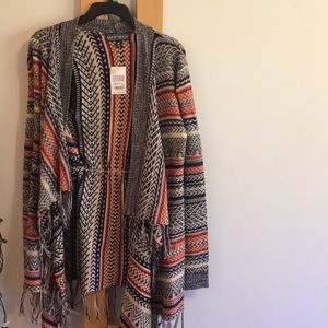 Multi colored cardigan. Size M